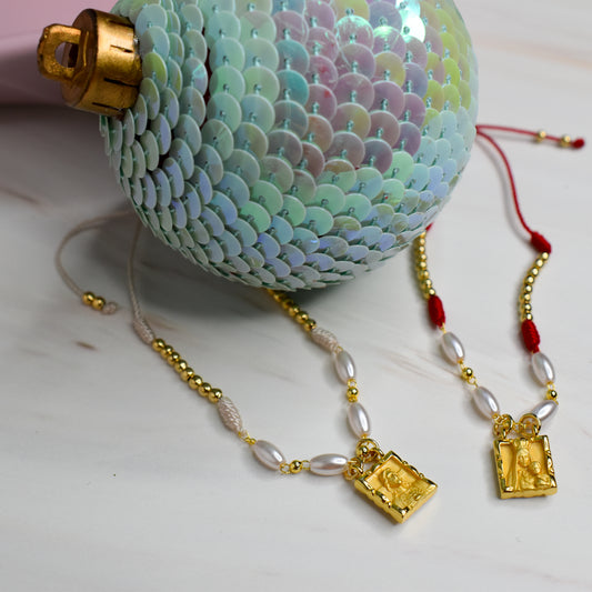 Pulsera de hilo + perlas y dije